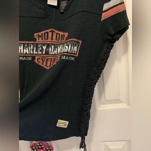 Very lightly worn top. Has sexy laces up sides.
